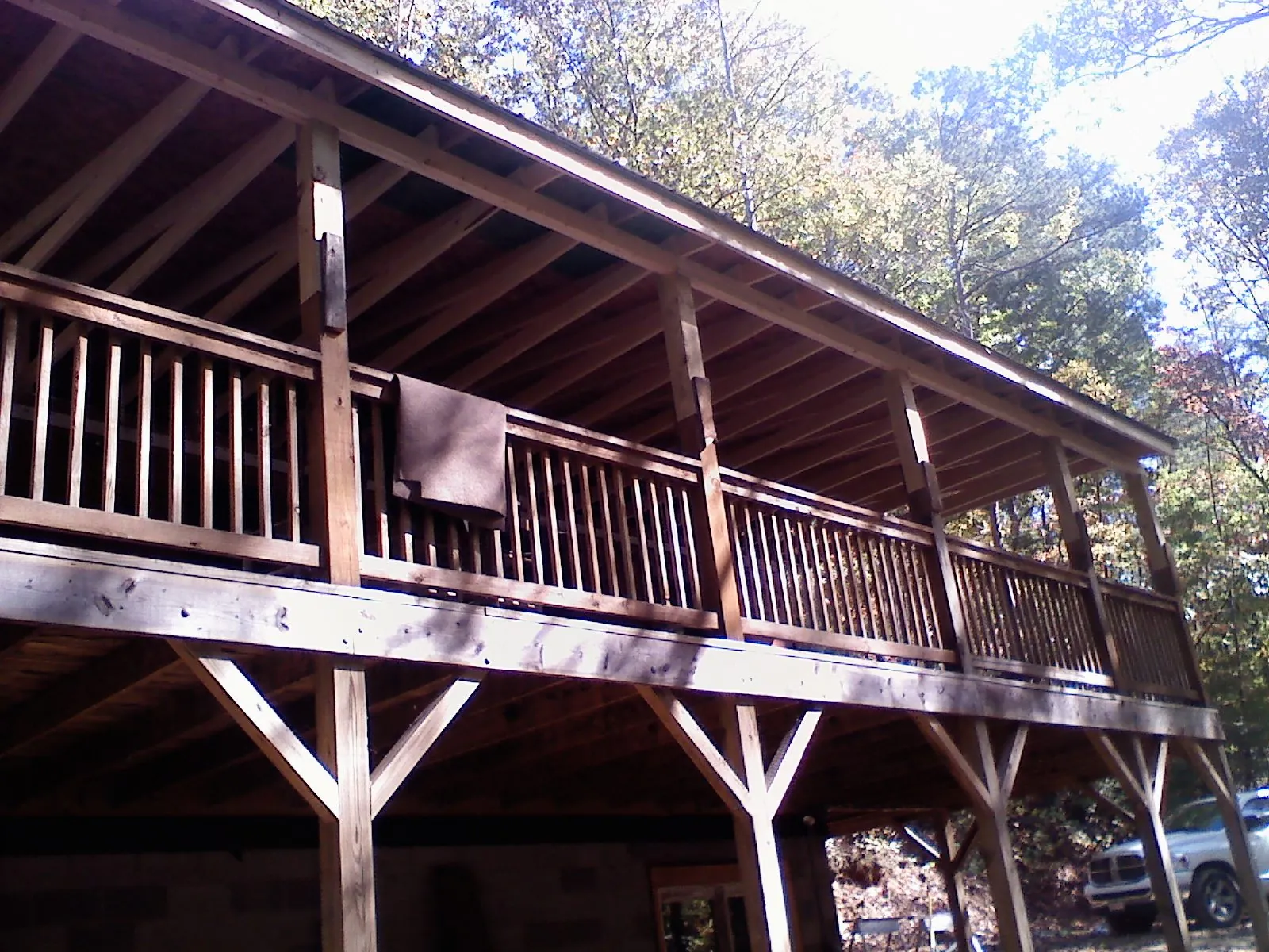 Timber framing under a new elevated porch and deck — Roof Leak Repair in Humansville by Roofing Brothers